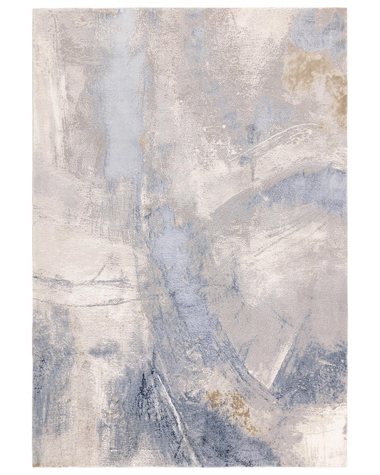 An abstract patterned rug featuring cream, grey, and blue hues, adding a modern touch to any living space.