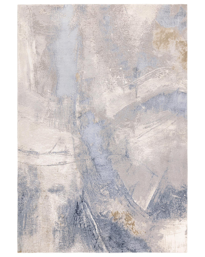 An abstract patterned rug featuring cream, grey, and blue hues, adding a modern touch to any living space.