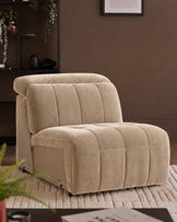 Skye single sofa module in champagne fabric, featuring quilted channel design and rounded silhouette on casters.