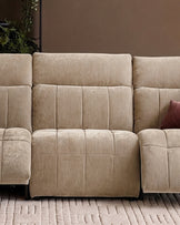 Champagne fabric single sofa module with quilted cushioning and clean lines, shown in close-up detail.