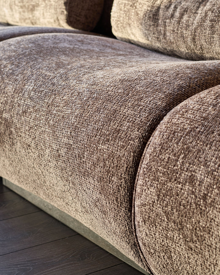Sofia 2-seater sofa in mocha fabric, close-up of curved armrest and seat cushion detail.