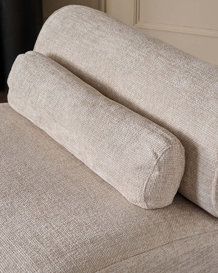 Sofia 2-seater sofa in natural fabric, close-up of rolled armrest detail and seat cushion.