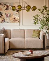 Teagan left-hand small corner sofa in champagne fabric, shown in a styled living room setting with accessories.