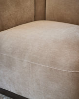 Teagan left-hand small corner sofa in champagne fabric, showing curved seat detail and upholstered back.
