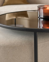 Thea smoked mirror coffee table and cream fabric pouffe set