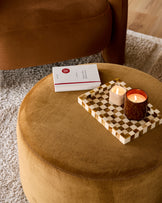 Thea smoked mirror coffee table and ochre fabric pouffe set