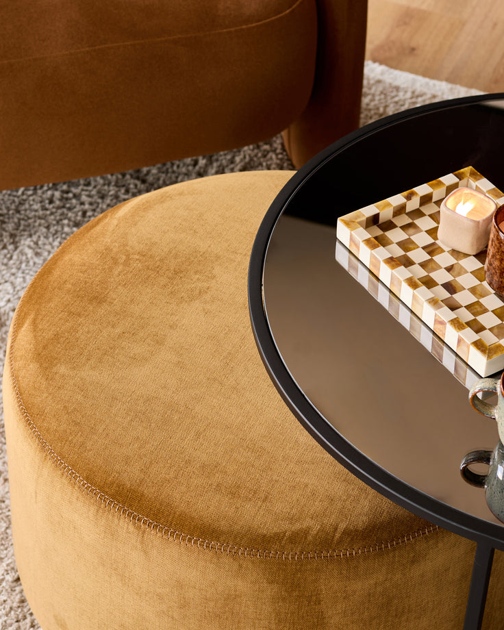 Thea smoked mirror coffee table and ochre fabric pouffe set