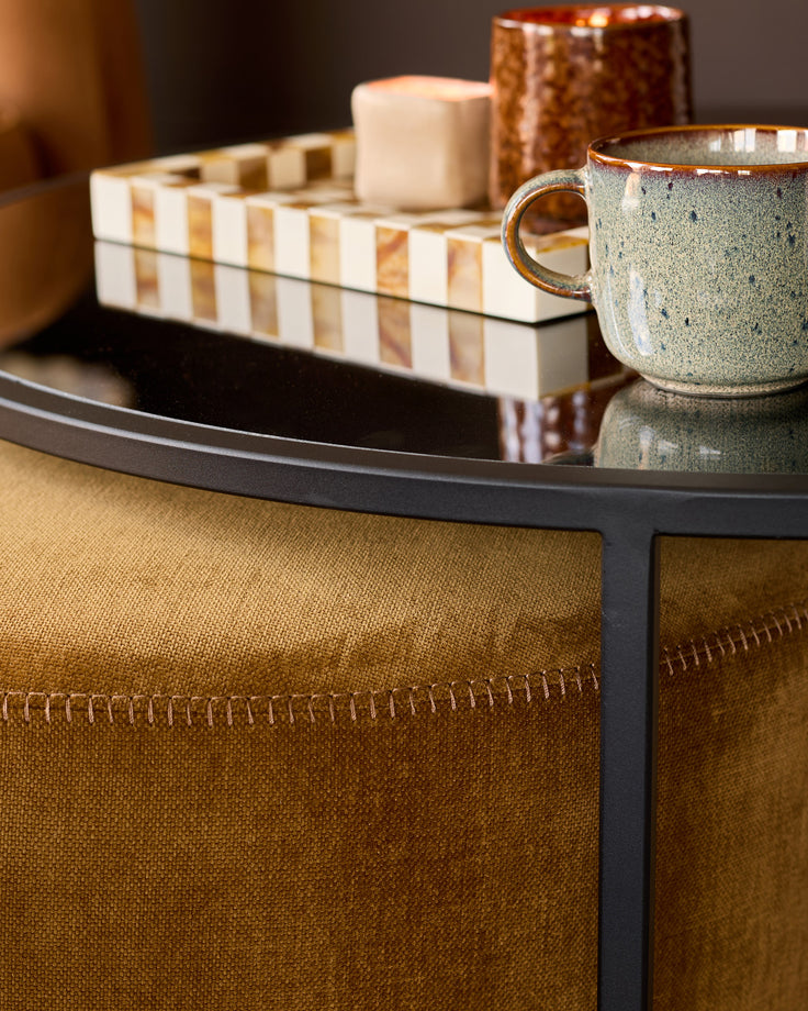 Thea smoked mirror coffee table and ochre fabric pouffe set
