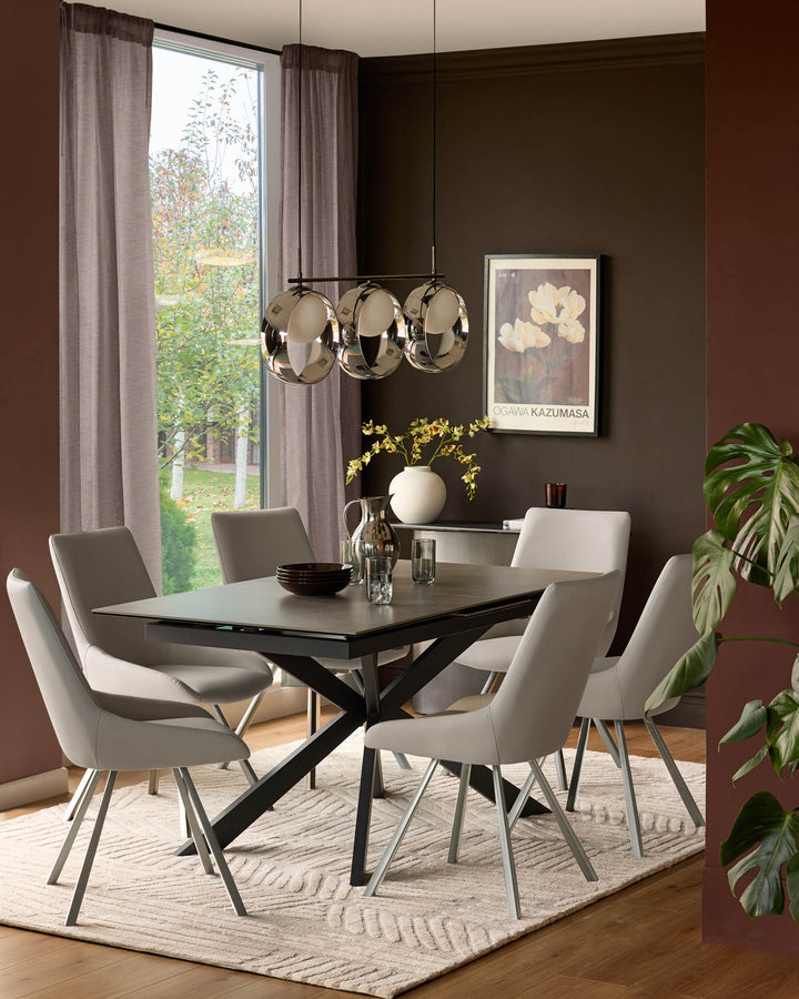 Chloe 3-pendant light with silver chrome finish and glass shades, suspended over dining table in modern room setting.