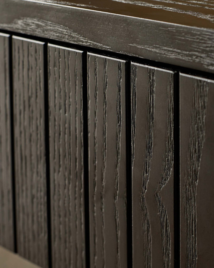 Dark wood cabinet with vertical panelling and a sleek, contemporary design.