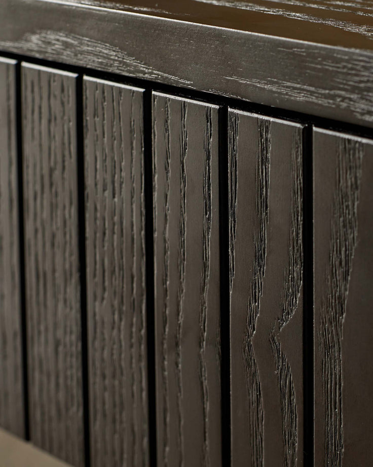 Dark wood cabinet with vertical panelling and a sleek, contemporary design.