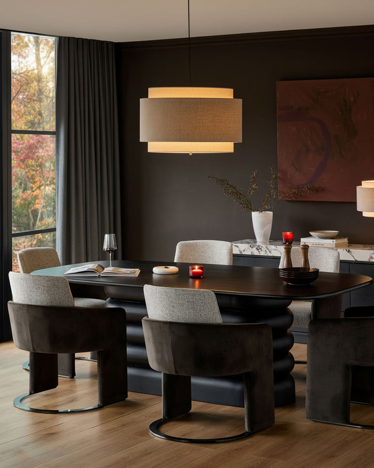 Wren cantilever dining chair in grey fabric and dark chocolate finish, shown in modern dining room setting.