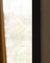 Yannis black arch wall mirror