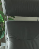 Karma white leather swivel recliner accent chair and footstool