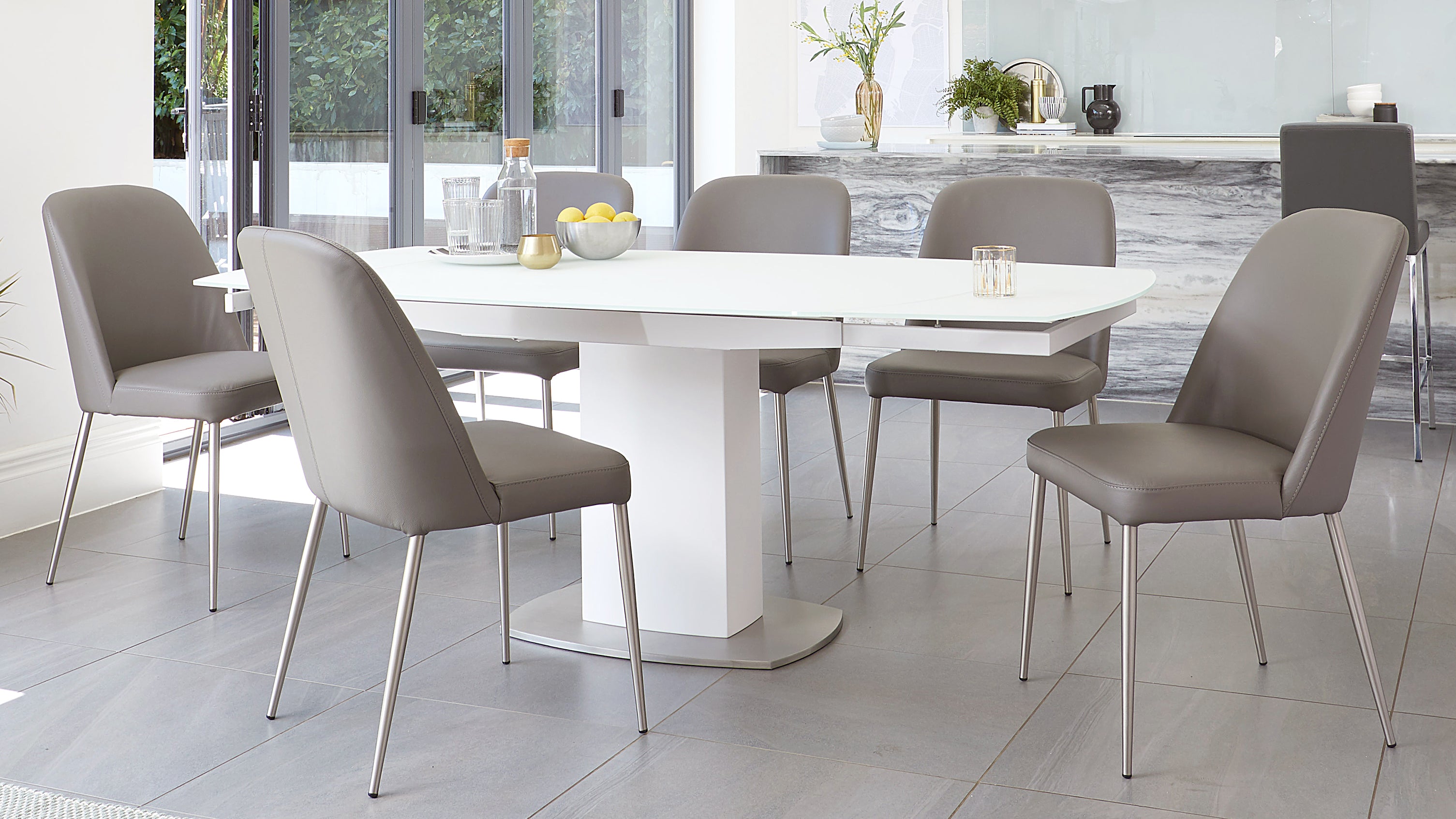 Camillo White Extending Table And Deco Real Leather Dining Chairs