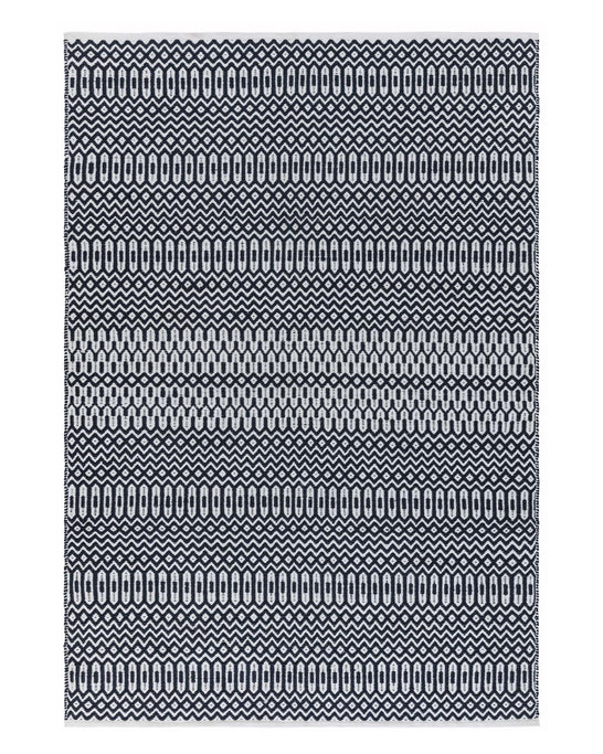 Contemporary black and white patterned area rug.