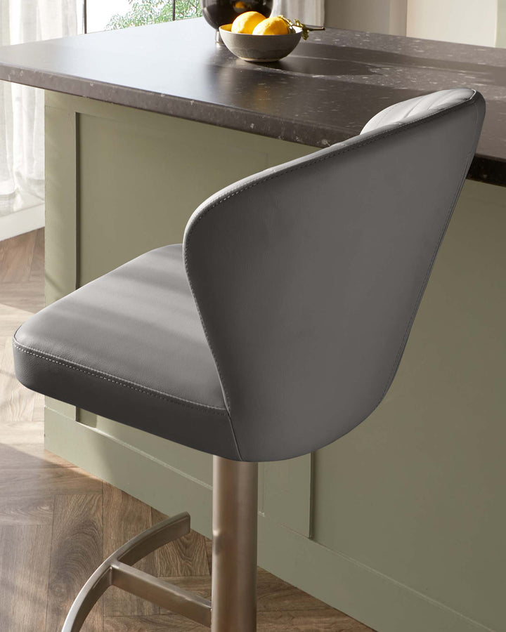 Contemporary grey upholstered bar stool with a curved back and sleek metal base.