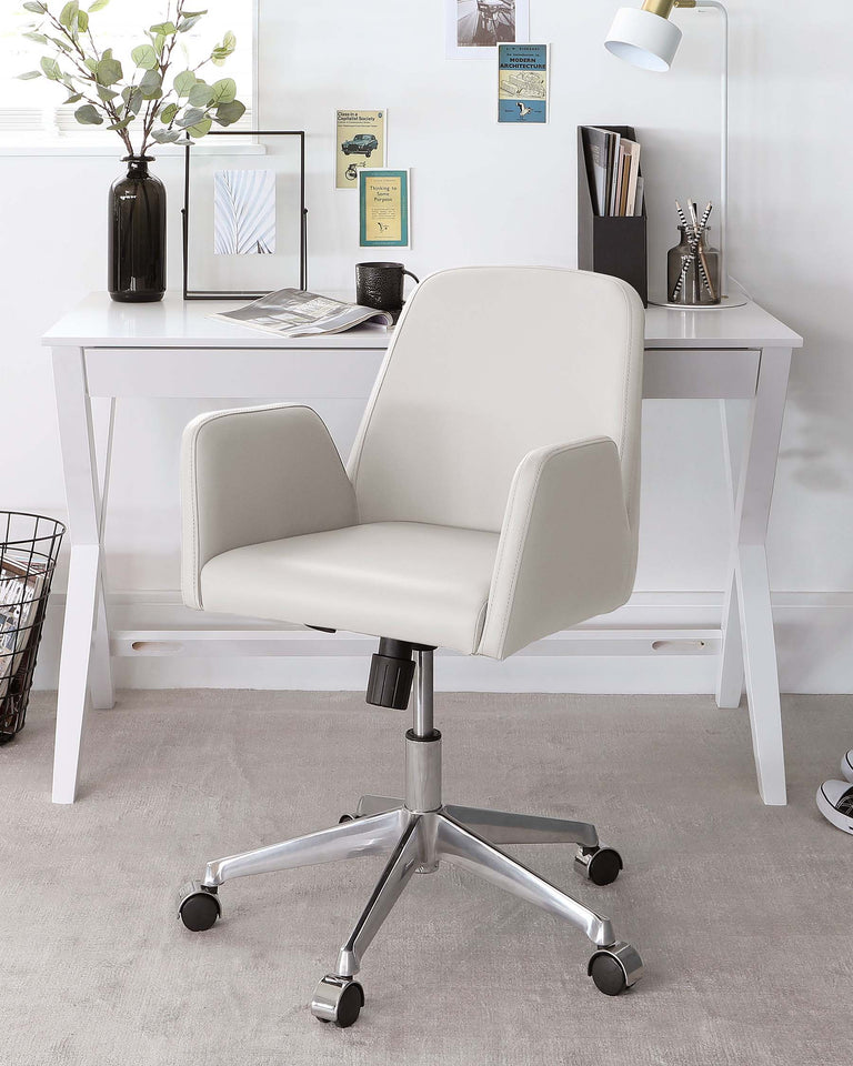 Modern home office setup featuring a sleek white writing desk and a comfortable white office chair with a high back, arm rests, and a five-star base with caster wheels for easy mobility. The desk and chair have a minimalist aesthetic suitable for contemporary interiors.