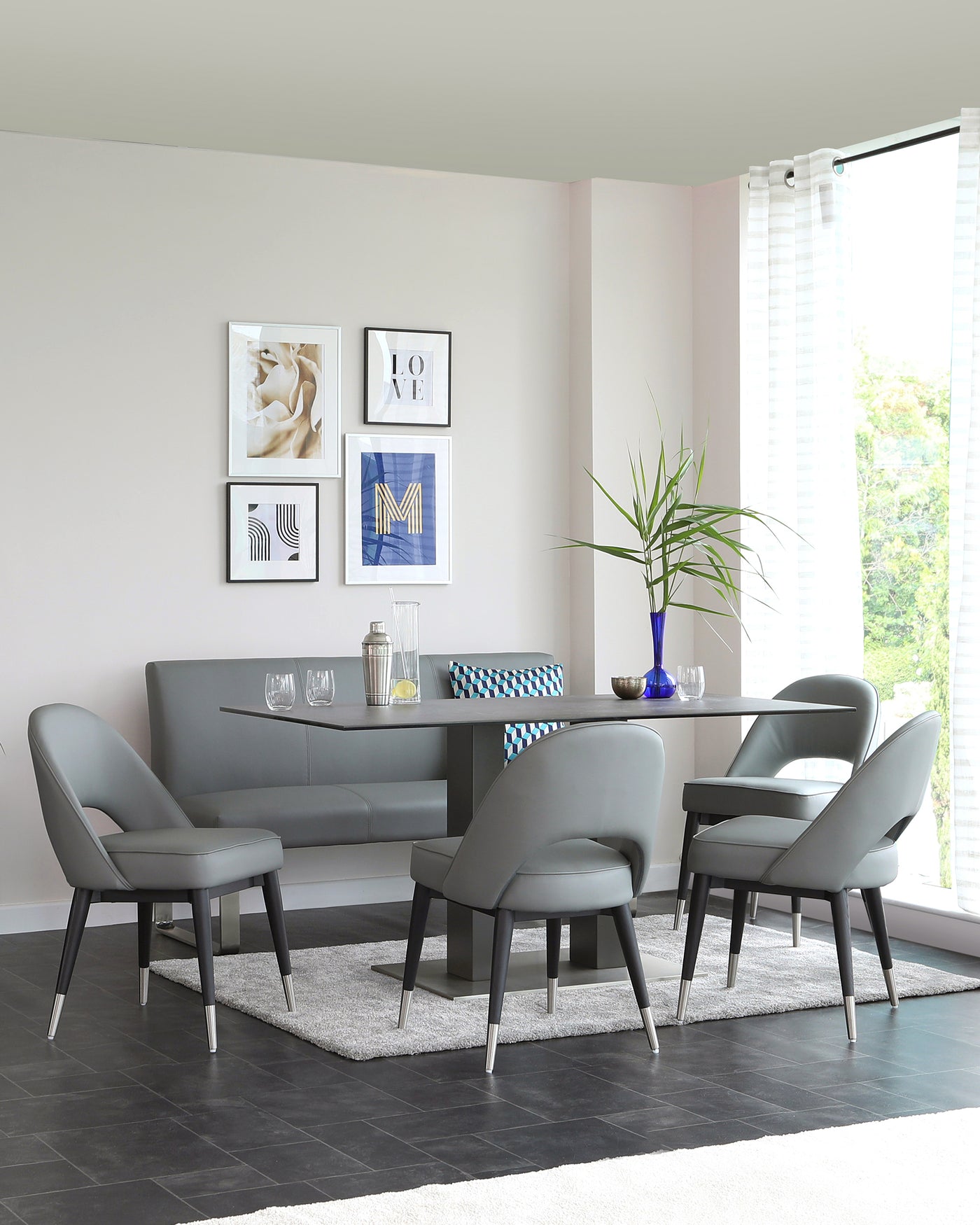 mia grey ceramic table with loop dining bench and clover chair set