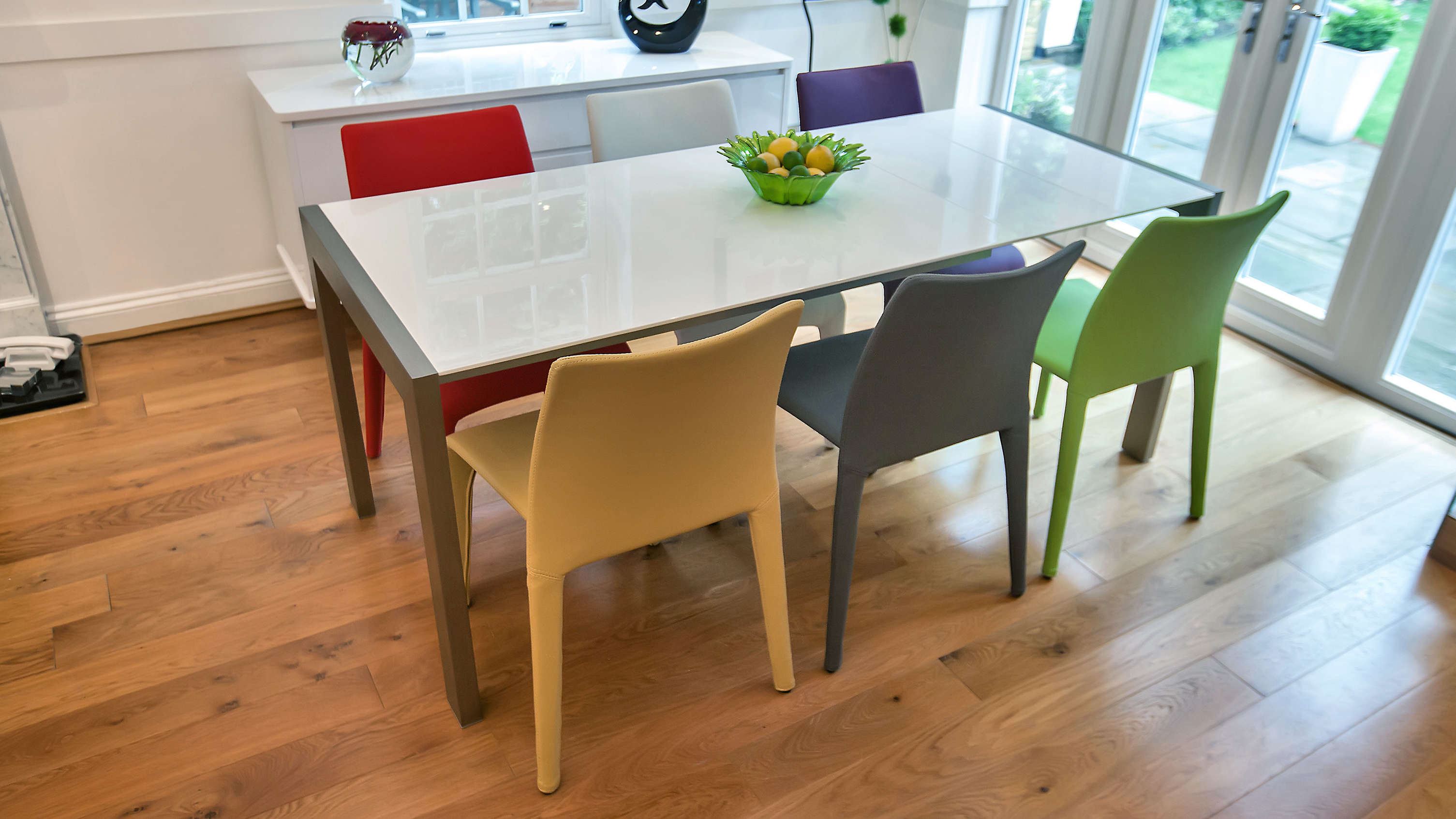 White Gloss  Extending Dining Set With Coloured Chairs
