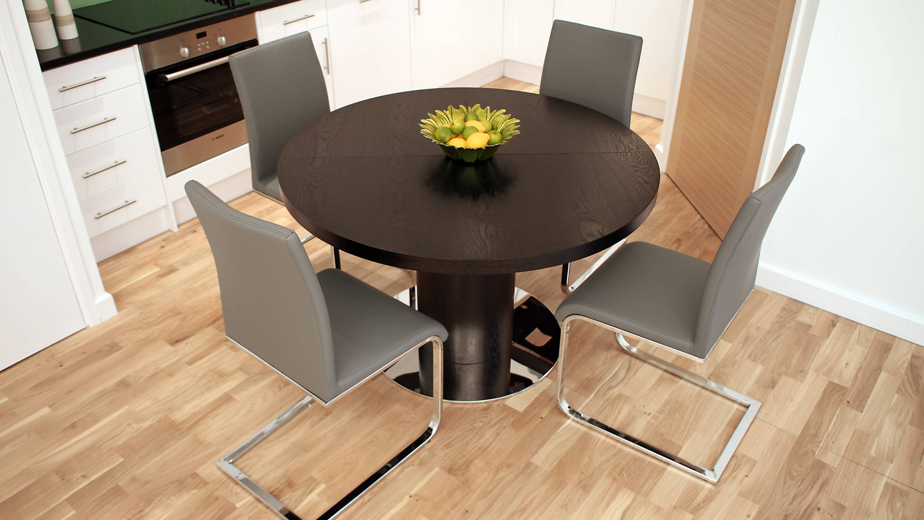 Round Wenge Extending Dining Table and Grey Dining Chairs