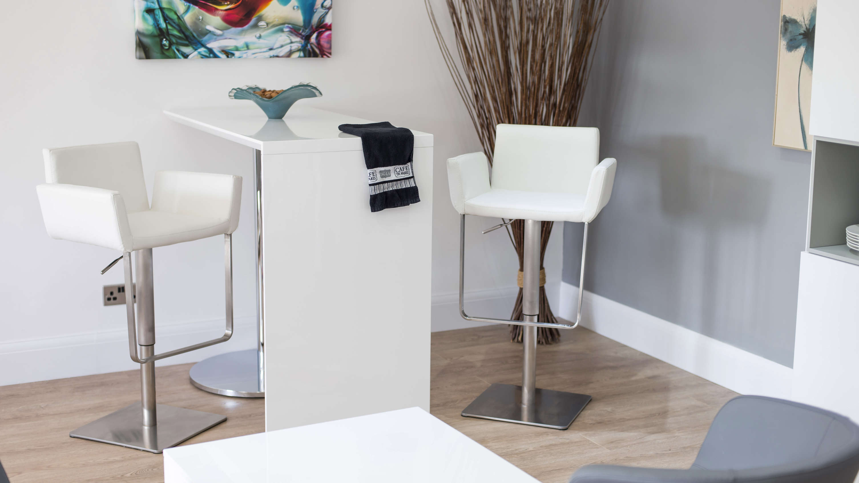 Modern White Bar Stools with a Brushed Metal Base